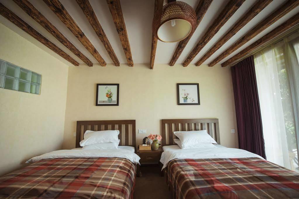 Li Jiang Wish Villa Hostel Лиджанг Екстериор снимка